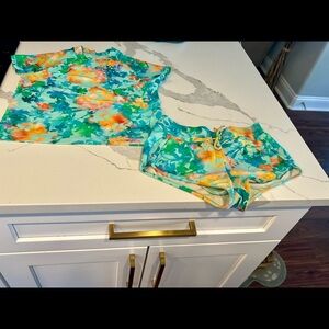 Athleta Girl rash guard and swim shorts